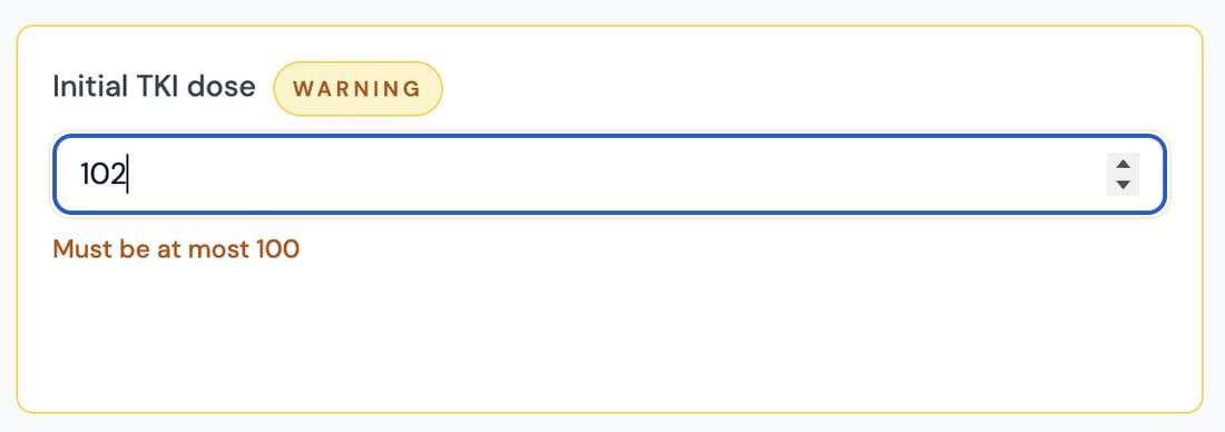 A non-blocking out-of-range warning during data entry.